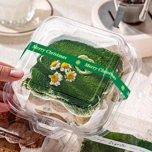 Green Christmas sealing sticker with Merry Christmas text on clear cake container