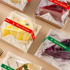 Christmas baking sealing stickers applied to dessert boxes with Merry Christmas text
