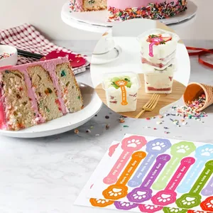 Detailed macro view of colorful paw print long strip stickers applied to cake jars