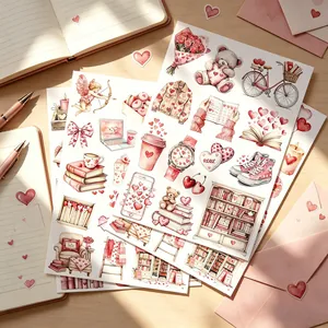 Close-up van roze aquarelstickers voor creatieve DIY-scrapbooking en versiering