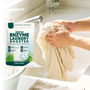 Action shot of Jakehoe 100g enzyme laundry booster powder used for hand washing clothes