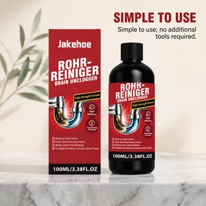 Detailweergave van Jakehoe ontstopper fles en doos op marmeren ondergrond