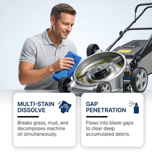 Lawn mower cleaner spray being used to remove grass and mud from the mower blades
