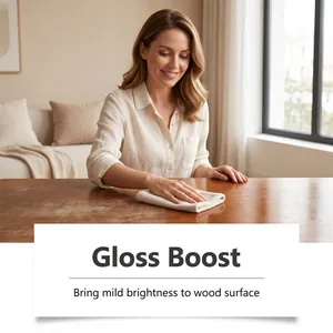 Detail showing gloss boost effect on wood surface with furniture polish agent