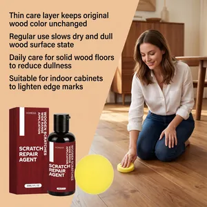 HOMEXA wood scratch repair agent being applied to a hardwood floor using a yellow sponge