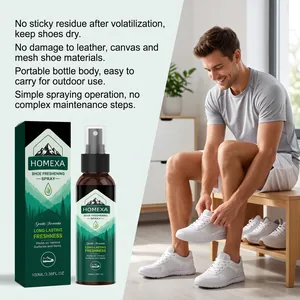 Man applying HOMEXA shoe freshening spray to white sneakers in a bright home setting