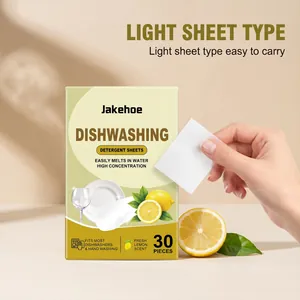 Close-up view of a single Jakehoe detergent sheet being held above the product box