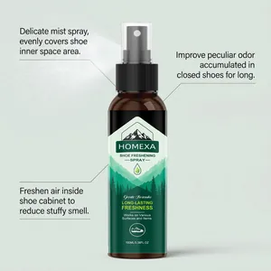 Close-up of HOMEXA shoe freshening spray bottle with mist showing delicate and even coverage