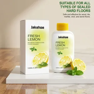 Detailed view of Jakehoe fresh lemon floor cleaner with its packaging on marble floor