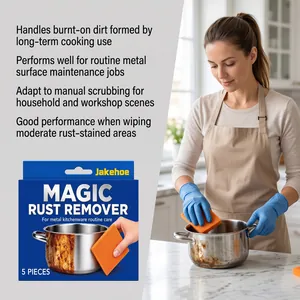 A detailed demonstration of JAKEHOE rust remover pads cleaning a stainless steel pot.