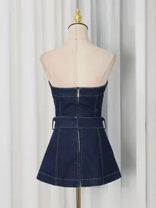 Elegant slim fit dark blue denim strapless tube top with matching belt from back view.