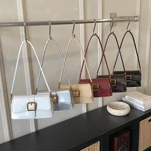 Stylish vintage baguette handbags with glossy finish and metal buckles in multiple colors