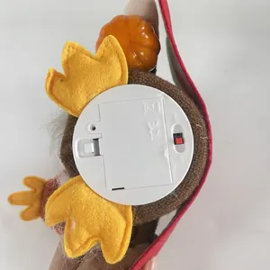 Close-up of bottom battery compartment and on/off switch for lighted harvest gnome.