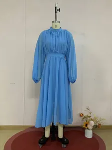 Elegant light blue pleated long sleeve chiffon midi dress shown on a professional mannequin