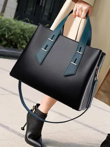 Elegante borsa tote in pelle nera e verde acqua capiente per donna ufficio moderna