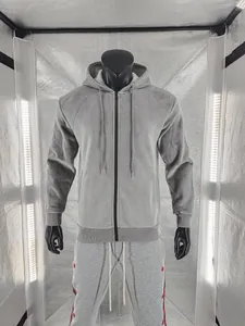 Detail of grey men's pineapple grid zip-up hoodie featuring thick textured fabric