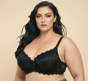 Detailed view of plus size black lace bra featuring romantic French style embroidery
