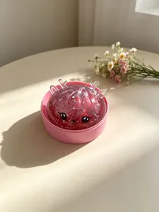 Süßer Weihnachts-Rentier-Knödel-Squishy mit rotem Glitzer-Gel vulling in rosa Schale
