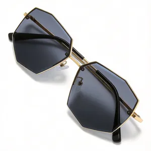 Stylish polygonal sunglasses with gold metal frame and UV protection grey lenses
