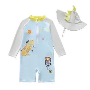 Children's blue long sleeve dinosaur one-piece swimwear set with matching sun hat