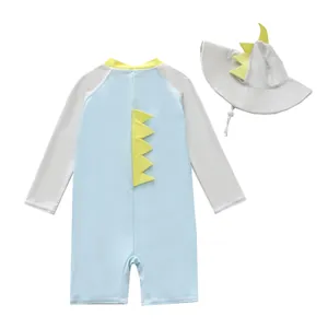 Cute light blue boys dinosaur one-piece swimsuit rash guard with matching sun hat set