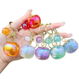Set of vibrant iridescent persimmon keychains, cute decorative bag charm for gift