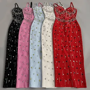 Detail shot showing variety of colorful bandage dresses with rhinestone embellishments