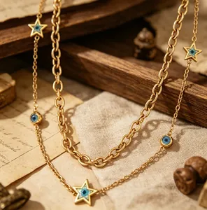 Detailed macro shot of 18K gold plated double layer necklace with star charms