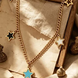 Vintage style 18K gold plated titanium steel necklace with colorful enamel star charms.