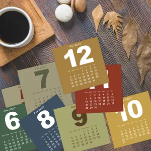 Aesthetic minimalist 2027 calendar cards for wall decoration in a cozy desk setting