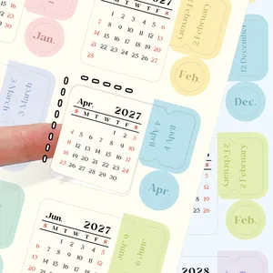 Close-up detail of 2027 pastel calendar stickers for journal decoration
