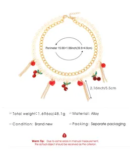 Detail view of double-layer pearl and cherry necklace with full dimensions info