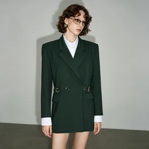 Detailed view of an elegant forest green slim fit blazer with decorative waist buckle