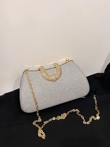 Funkelnde silberne Abendtasche mit Strass-Hufeisengriff und eleganter goldener Kette