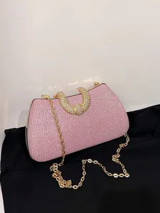 Elegante rosa glitzernde Abendtasche mit Strassgriff und goldener Metallkette