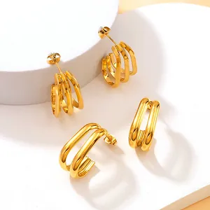 Detailed view of gold-plated titanium steel geometric earrings with multi-layer design