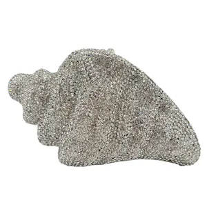 Luxurious sparkling shell-shaped rhinestone evening clutch bag with silver crystal details