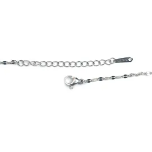 Detail shot of stainless steel necklace lobster clasp and adjustable extender chain