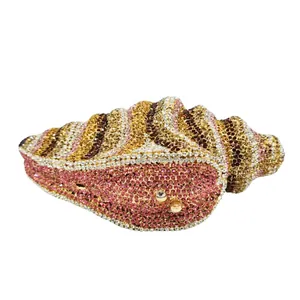 Luxurious conch shell shaped evening clutch bag fully embellished with colorful rhinestones