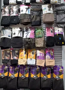 Wholesale display of various fleece-lined translucent leggings and warm winter pantyhose.