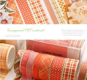 Detailopname van oranje geruit PET washi tape set voor scrapbooking in originele doos