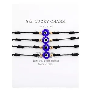 Handmade blue evil eye braided cord bracelet set of four with lucky charm gift card
