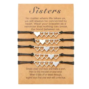Set of 5 stainless steel heart braided bracelets on kraft display card for sisters