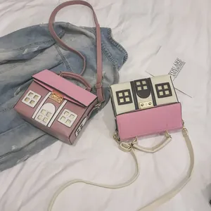 Creative house-shaped crossbody bag with contrasting colors and cute cartoon details.