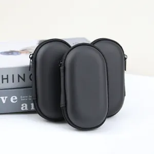 Three premium black oval EVA storage cases for wireless earphones and digital accessories