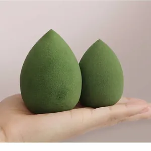 Visual comparison of teardrop makeup sponge expanding in size after getting wet