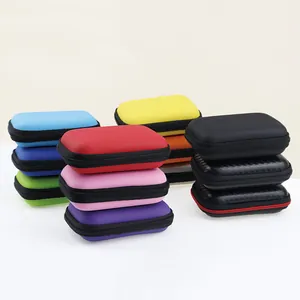 A colorful stack of portable EVA hard shell storage cases for earphones and cables