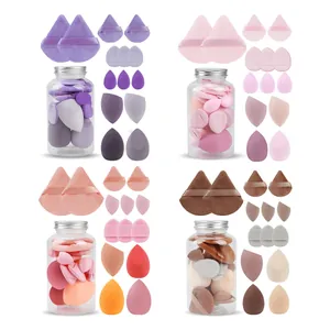 Professional 14-piece makeup sponge and powder puff set in clear jars, assorted colors