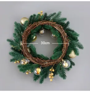 Detailed view of a 30cm Christmas wreath featuring green pine needles and gold ornaments.