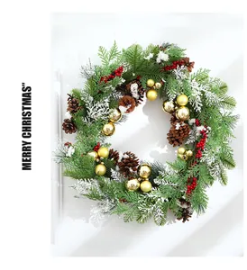 Detail of 50cm Christmas wreath with pine cones, red berries and gold baubles.